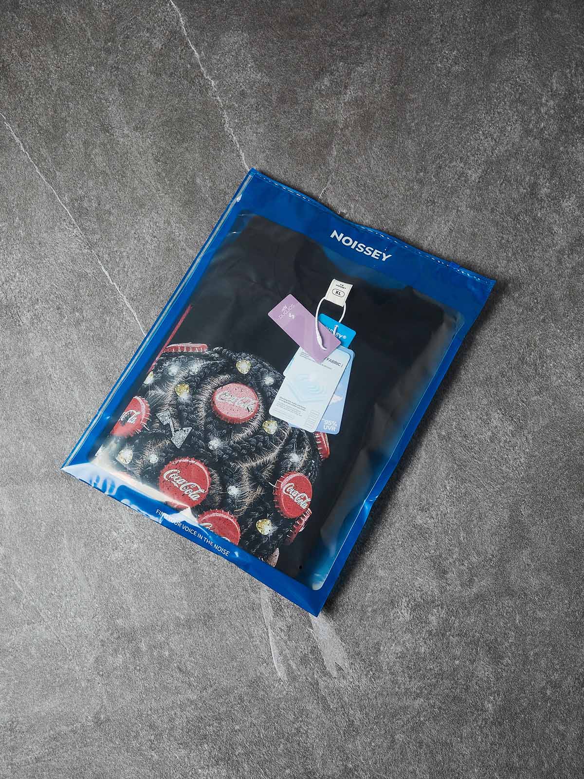 NOISSEY "BOTTLE CAP BRAIDS" POP ART - SHIMMERING OVERSIZED TEE - Image 9
